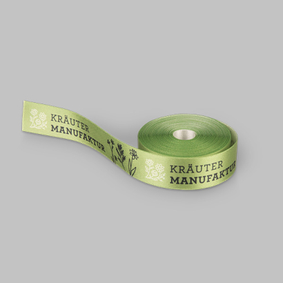 Geschenkbänder auf grauem Hintergrund