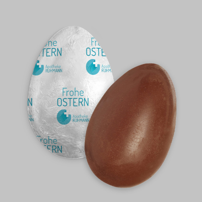 Individuell bedruckte Verpackung für Schoko-Ei auf grauem Hintergrund