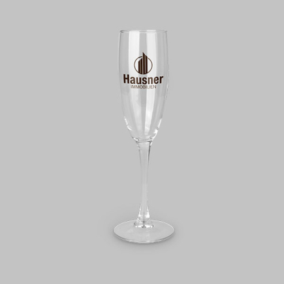 Sektglas LANG Siebdruck auf grauem Hintergrund