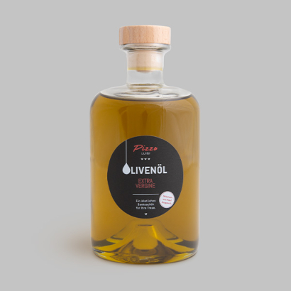 Olivenoel auf grauem Hintergrund