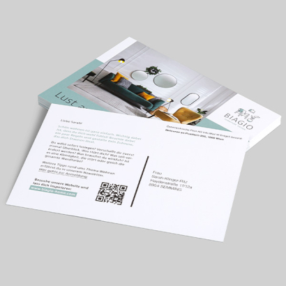 Postkarten inkl. Komplettservice auf grauem Hintergrund