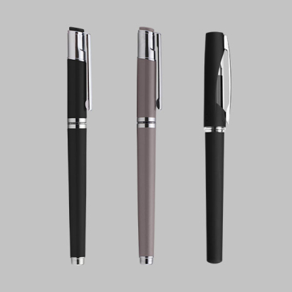 verschiedene Gelschreiber auf grauem Hintergrund