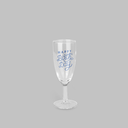 Sektglas KURZ mit Siebdruck auf grauem Hintergrund 