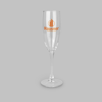 Sektglas LANG Siebdruck auf grauem Hintergrund
