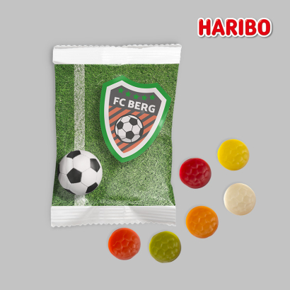 Individuell gestaltete Fruchtgummi Verpackung vor grauem Hintergrund