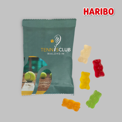 Individuell gestaltete Fruchtgummi Verpackung vor grauem Hintergrund