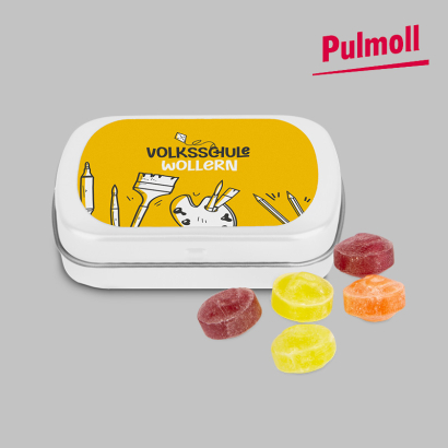 Individuell gestaltete Mini Klappdose Zuckerl vor grauem Hintergrund