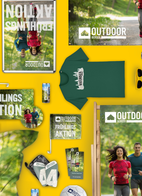 Outdoor Aktion 2025 mit diversen bedruckten Produkten im Hintergrund